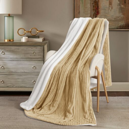 Throw Blanket Masterpiece Reem, brown color, soft touch , on a chair in a nice decorated room, Crafted from luxurious velvet, king, queen, single sizes, the Reem pattern design, combining classic elegance with contemporary flair, 200*230CM