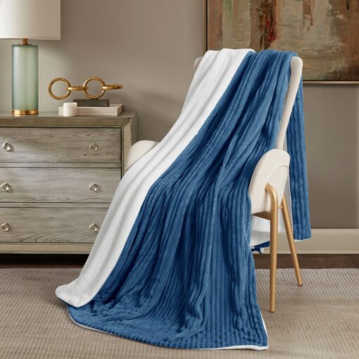 Throw Blanket Masterpiece Reem, blue color, soft touch , on a chair in a nice decorated room, Crafted from luxurious velvet, king, queen, single sizes, the Reem pattern design, combining classic elegance with contemporary flair, 200*230CM