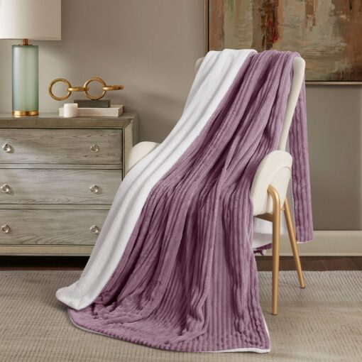 Throw Blanket Masterpiece Reem, purple color, soft touch , on a chair in a nice decorated room, Crafted from luxurious velvet, king, queen, single sizes, the Reem pattern design, combining classic elegance with contemporary flair, 200*230CM