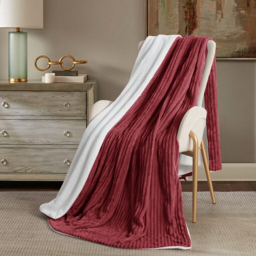 Throw Blanket Masterpiece Reem, red color, soft touch , on a chair in a nice decorated room, Crafted from luxurious velvet, king, queen, single sizes, the Reem pattern design, combining classic elegance with contemporary flair, 200*230CM