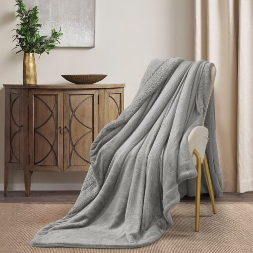 Throw Blanket Masterpiece Amira design, silver color, Made from plush velvet, this blanket offers a soft and rich texture, 200 x 230 CM, King-sized bed, on chair in a nice decorated room