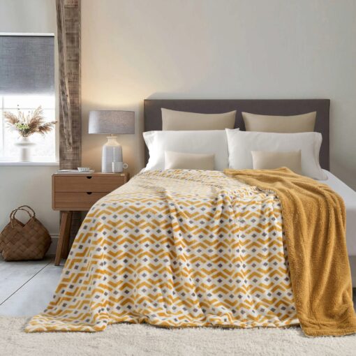 Throw Blanket Apollo Jomana King 200*230CM, queen, single sizes, white and brown colors, beautiful design pattern, made from rich velvet fabric, spreads on a queen bed with two cushions and four pillows in a nice decorated room